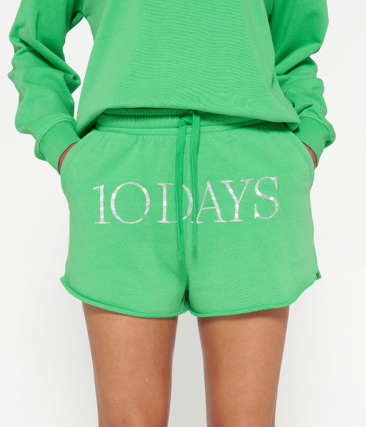 beach shorts logo | apple green