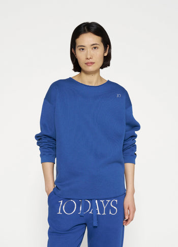 raw edge statement sweater | true blue