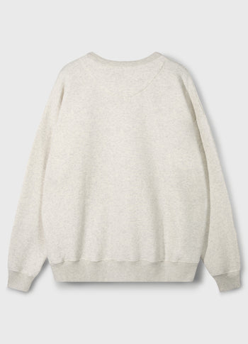 the festive statement sweater | soft white melee