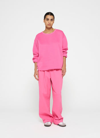 raw edge sweater | bright pink