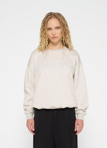 the festive statement sweater | soft white melee